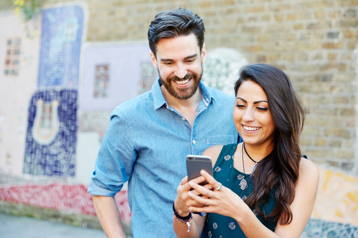 Couple learning about ways to build credit without a credit card.