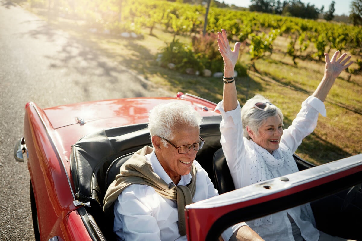 Couple celebrating after they save for retirement